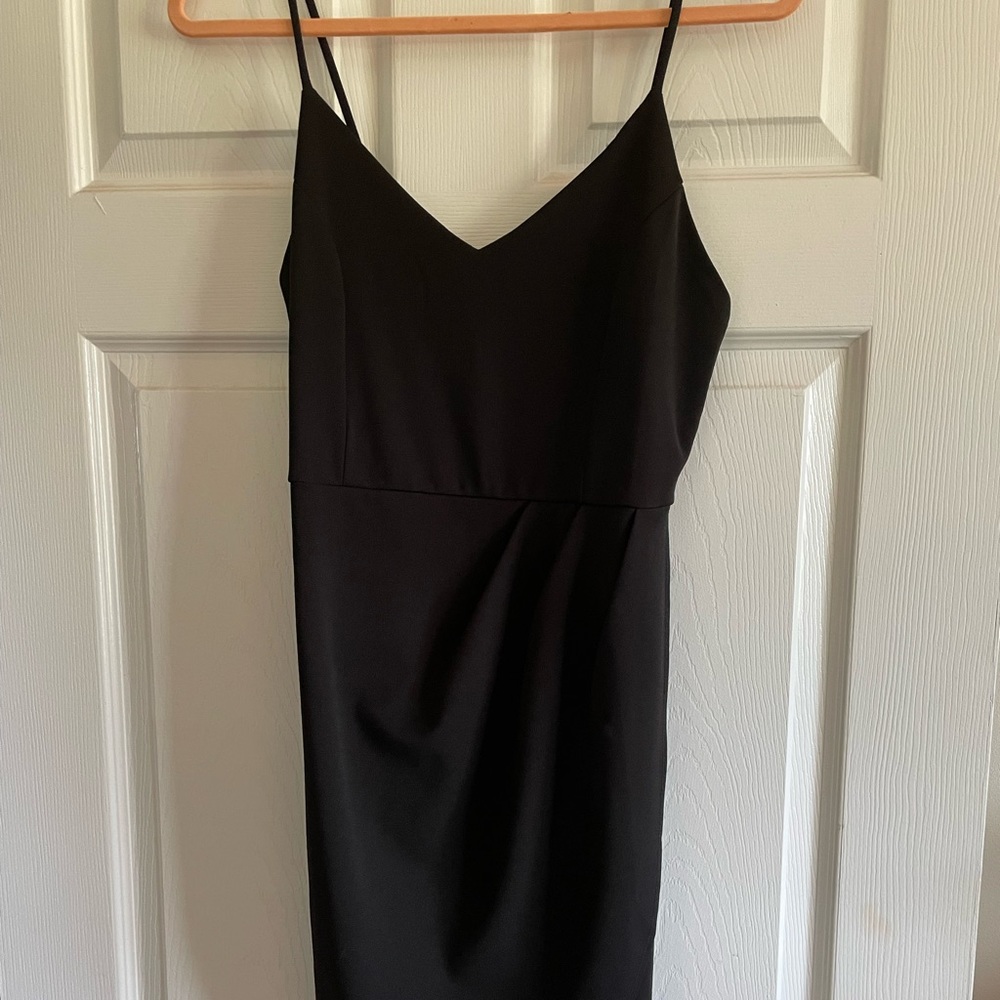 Incredibly flattering little black dress.
